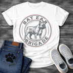 French Bulldog t-shirt with vintage stamp style circular badge, detailed engraving illustration of a Frenchie standing full body, arched text reading Bat Ear Brigade in distressed terracotta and navy, worn vintage texture throughout, no background