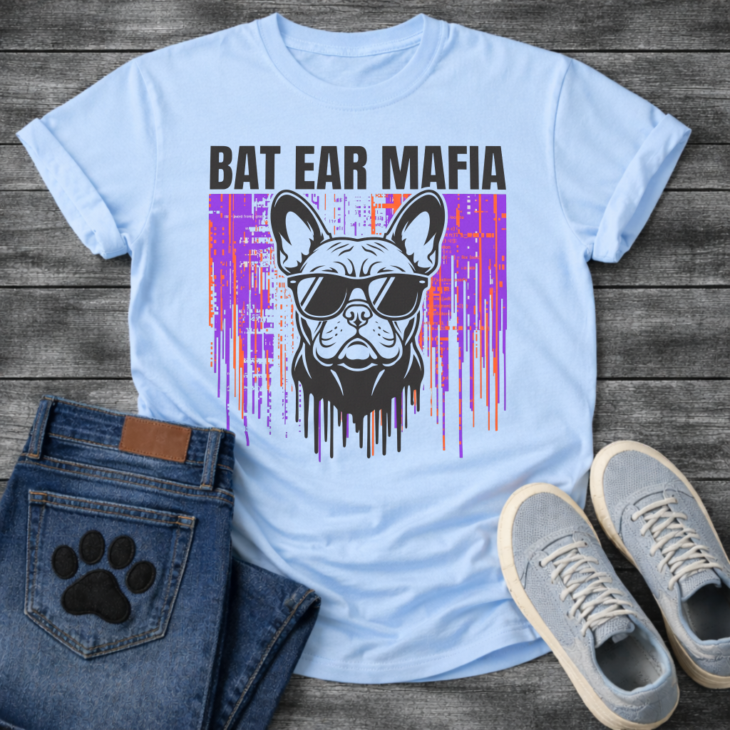 French Bulldog t-shirt with bold black block text reading Bat Ear Mafia above a Frenchie portrait wearing sunglasses, purple and orange glitch data drip background, black ink dripping below, high impact streetwear graphic
