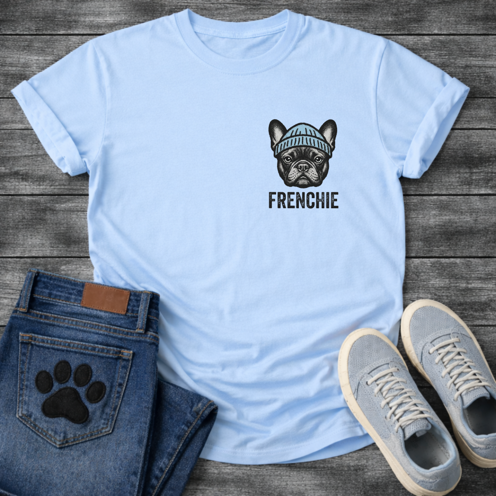French Bulldog portrait wearing a blue beanie with Frenchie bold typography pocket graphic tee