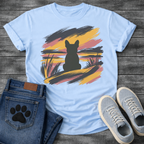French Bulldog t-shirt with bold Frenchie silhouette seen from behind centered in an abstract brushstroke landscape, sweeping strokes of navy gold and dusty rose with grass detail, no text expressive painterly graphic