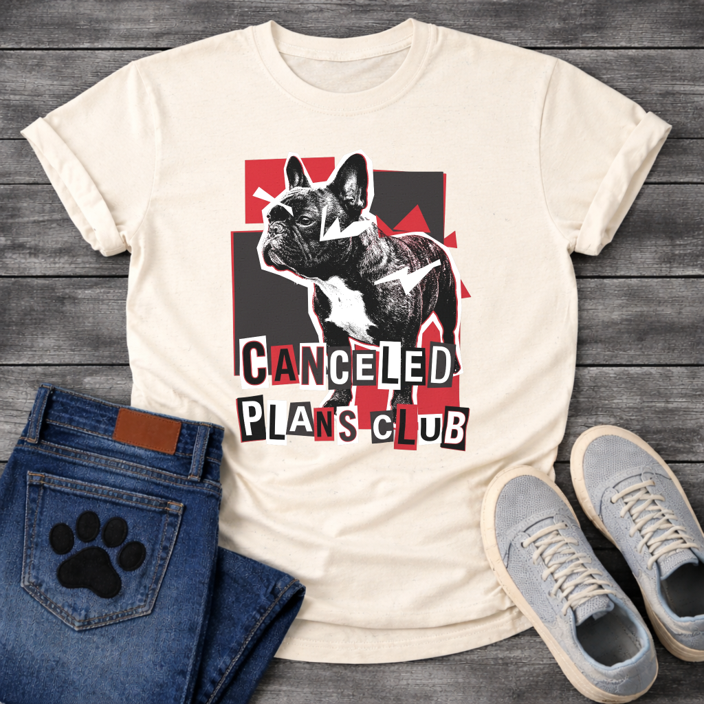 French Bulldog t-shirt with high contrast black and white Frenchie portrait over red and black geometric block background, ransom cut-out style bold text below reading Canceled Plans Club, punk collage graphic with white arrow accents