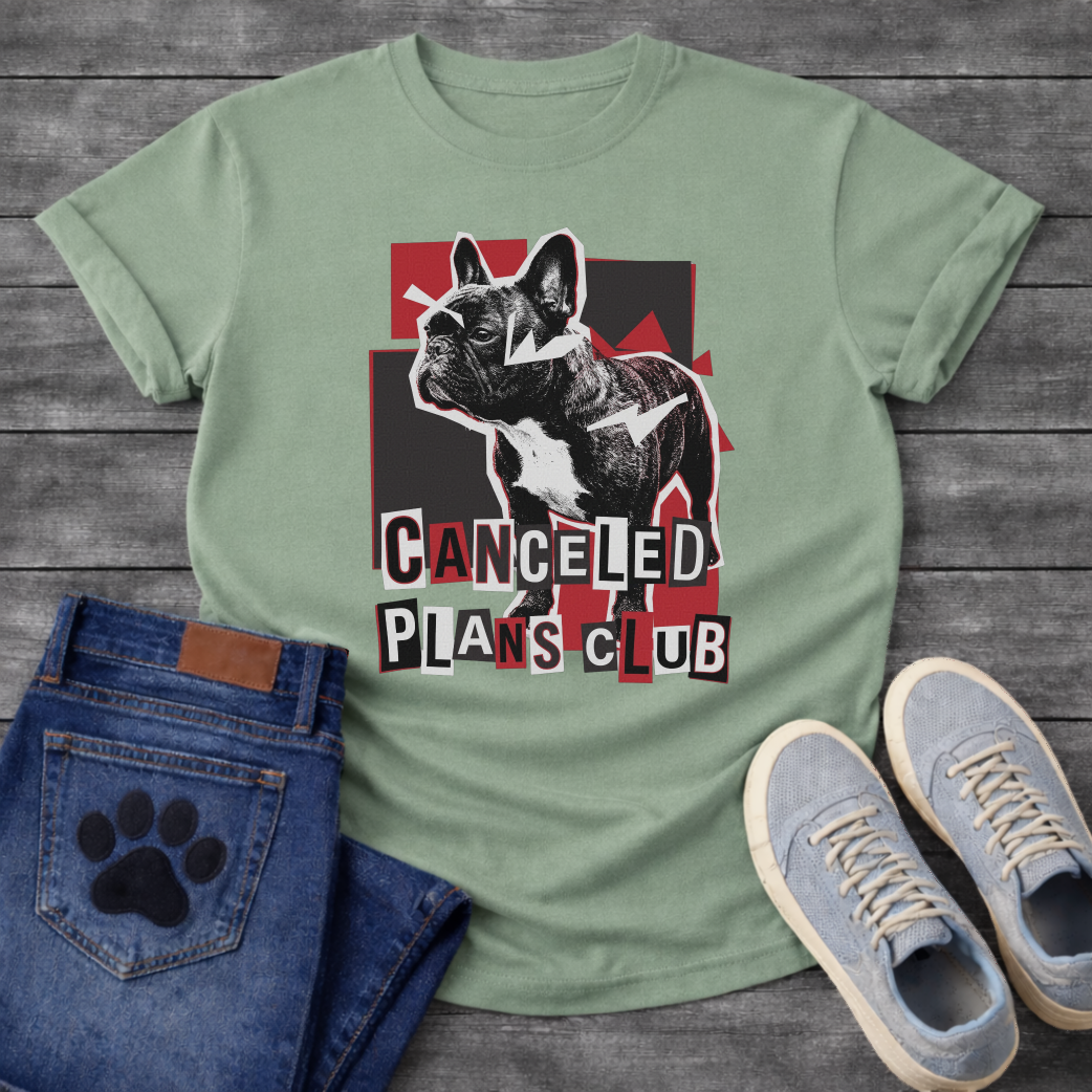 French Bulldog t-shirt with high contrast black and white Frenchie portrait over red and black geometric block background, ransom cut-out style bold text below reading Canceled Plans Club, punk collage graphic with white arrow accents