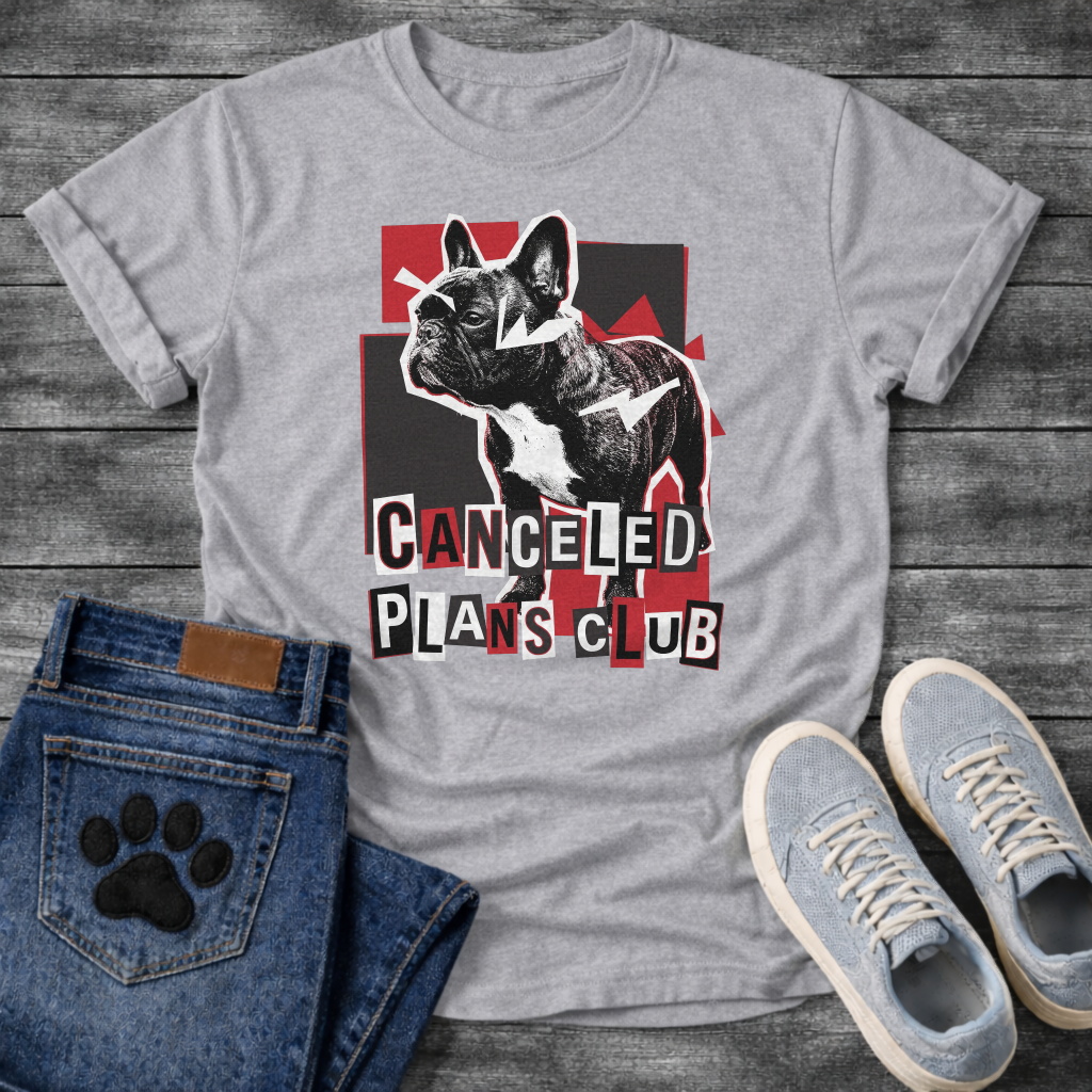 French Bulldog t-shirt with high contrast black and white Frenchie portrait over red and black geometric block background, ransom cut-out style bold text below reading Canceled Plans Club, punk collage graphic with white arrow accents