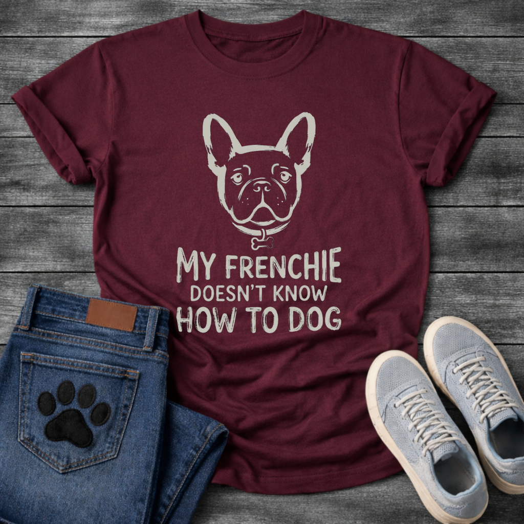 French Bulldog face illustration with bone collar and My Frenchie Doesn't Know How To Dog typography graphic tee
