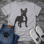 French Bulldog t-shirt with bold full body Frenchie silhouette standing facing forward, white chest patch detail visible, clean single black ink graphic, minimal no text design