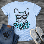 Bulldog t-shirt with street art style Frenchie wearing sunglasses reflecting a city skyline, bold electric blue graffiti text reading Frenchie Dad with drip paint effects, two-color urban graphic on warm sand tee