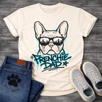 Bulldog t-shirt with street art style Frenchie wearing sunglasses reflecting a city skyline, bold electric blue graffiti text reading Frenchie Dad with drip paint effects, two-color urban graphic on warm sand tee