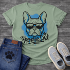 French Bulldog t-shirt with graffiti style Frenchie wearing city skyline sunglasses, electric blue spray paint halo behind the portrait, bold graffiti tag text reading Frenchie Dad with star and blue drip below