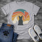 French Bulldog t-shirt with Frenchie silhouette seen from behind centered in a large retro wavy swirl circle, flowing bands of teal terracotta orange gold and cream with distressed vintage texture, no text, painterly boho graphic