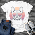 French Bulldog t-shirt with detailed stipple engraving Frenchie portrait wearing aviator sunglasses reflecting retro stripe sunset, blush pink mauve and purple striped circle behind, distressed vintage texture, no text fine art graphic
