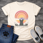 French Bulldog silhouette from behind facing a rainbow sunset with Live Like The Gate Was Left Open typography graphic tee