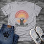 French Bulldog silhouette from behind facing a rainbow sunset with Live Like The Gate Was Left Open typography graphic tee