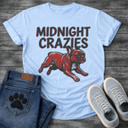 French Bulldog t-shirt with bold retro shadow typography reading Midnight Crazies above a halftone Frenchie running at full speed in deep red and slate blue, vintage circus style graphic

