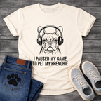 French Bulldog wearing gaming headphones graphic tee, gestural ink illustration, text reads I Paused My Game To Pet My Frenchie