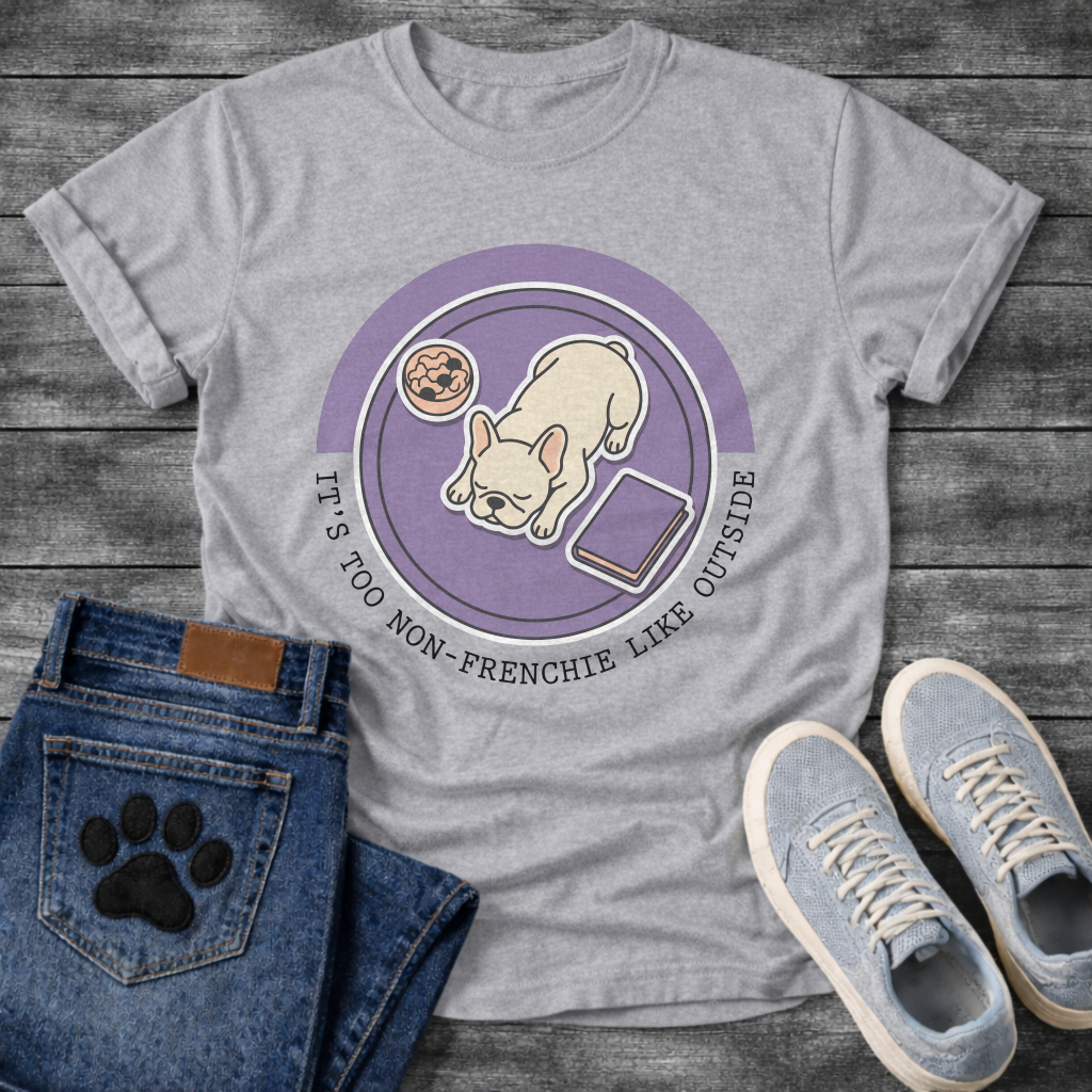 French Bulldog sleeping top-down view with food bowl and book It's Too Non-Frenchie Like Outside badge graphic tee
