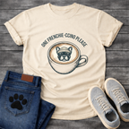 French Bulldog in a beanie sitting in a coffee cup with One Frenchie-ccino Please arc typography full front graphic tee
