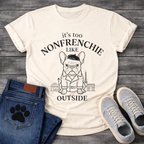 French Bulldog in beret and trench coat with Paris skyline It's Too Non-Frenchie Like Outside typography graphic tee
