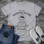 French Bulldog in beret and trench coat with Paris skyline It's Too Non-Frenchie Like Outside typography graphic tee
