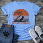 French Bulldog t-shirt with retro striped sunset scene, Frenchie silhouette sitting beside a windswept tree against a large terracotta sun, bold text below reading Right Where I Belong, two-color vintage landscape illustration
