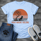 French Bulldog t-shirt with retro striped sunset scene, Frenchie silhouette sitting beside a windswept tree against a large terracotta sun, bold text below reading Right Where I Belong, two-color vintage landscape illustration
