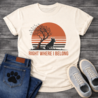 French Bulldog t-shirt with retro striped sunset scene, Frenchie silhouette sitting beside a windswept tree against a large terracotta sun, bold text below reading Right Where I Belong, two-color vintage landscape illustration
