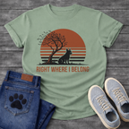 French Bulldog t-shirt with retro striped sunset scene, Frenchie silhouette sitting beside a windswept tree against a large terracotta sun, bold text below reading Right Where I Belong, two-color vintage landscape illustration
