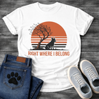 French Bulldog t-shirt with retro striped sunset scene, Frenchie silhouette sitting beside a windswept tree against a large terracotta sun, bold text below reading Right Where I Belong, two-color vintage landscape illustration
