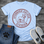 French Bulldog t-shirt with vintage rubber stamp circular badge, detailed Frenchie standing portrait centered, distressed collegiate text reading Stubborn Anchor Division around the border, single terracotta ink with heavy worn texture