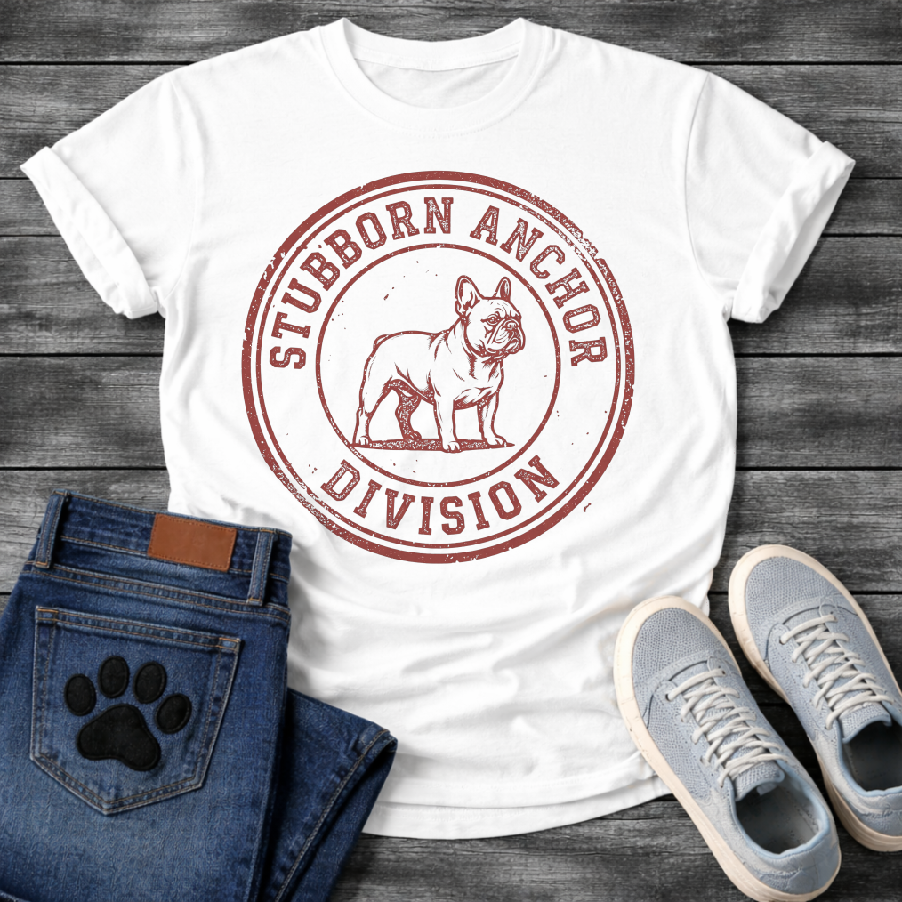 French Bulldog t-shirt with vintage rubber stamp circular badge, detailed Frenchie standing portrait centered, distressed collegiate text reading Stubborn Anchor Division around the border, single terracotta ink with heavy worn texture