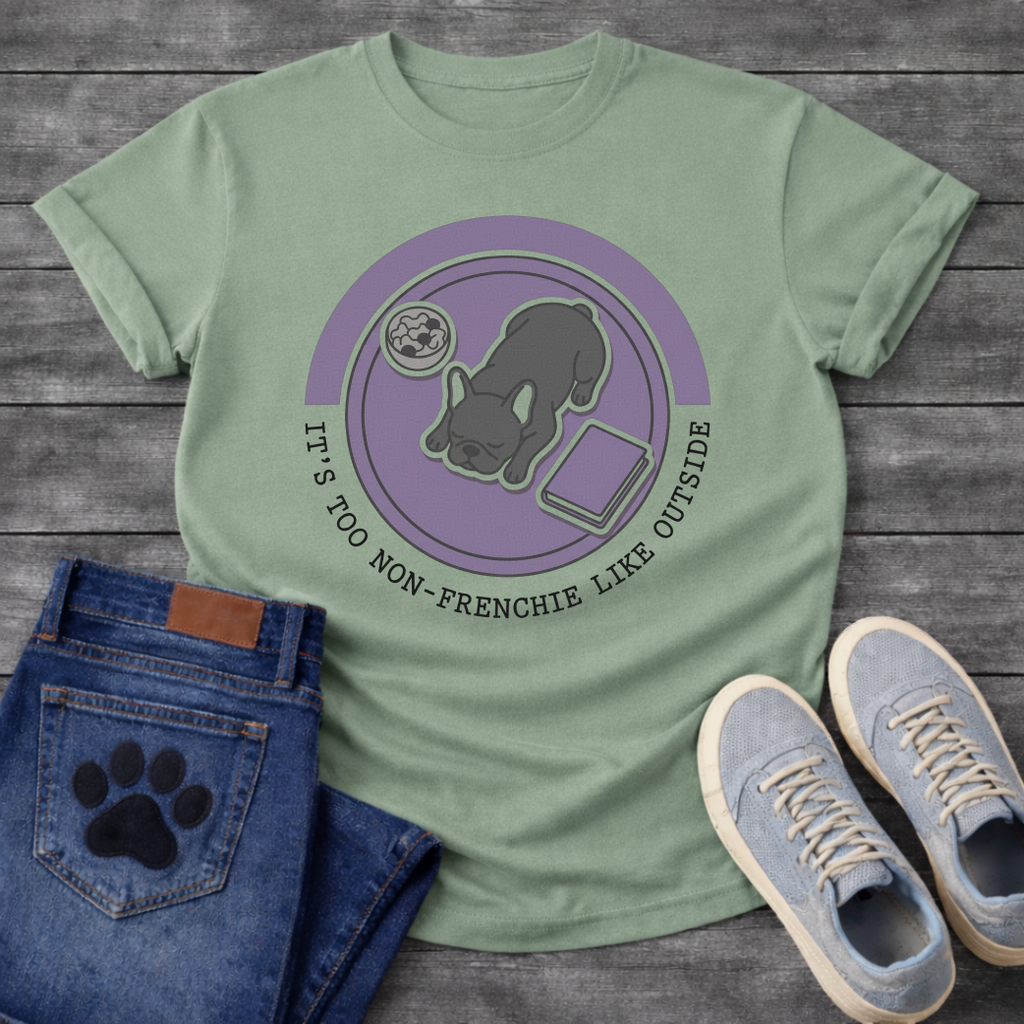 Blue French Bulldog sleeping top-down view with food bowl and book It's Too Non-Frenchie Like Outside badge graphic tee

