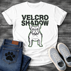 French Bulldog t-shirt with oversized bold black text reading Velcro Shadow above a detailed Frenchie portrait with neon green outline, black and green two-color streetwear graphic