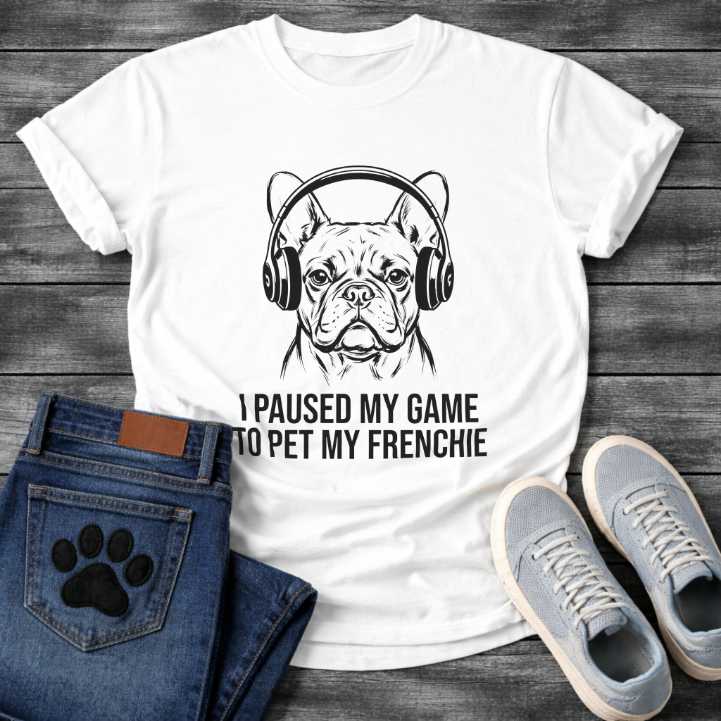 French Bulldog wearing gaming headphones graphic tee, gestural ink illustration, text reads I Paused My Game To Pet My Frenchie