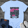 Just Because I Didn't Give Birth To Them Doesnt Mean I Wasn't Born To Love Them t shirt design in black and pink graffiti sticker style lettering with paw prints and crossbones