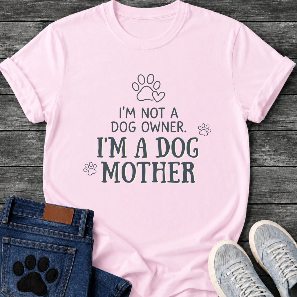 Charcoal graphic tee design with hand lettered "I'm Not a Dog Owner, I'm a Dog Mother" text, paw print and heart illustrations