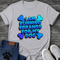 I Am Running Errands For My Dog t shirt design in bold blue gradient bubble lettering with bone shapes in the corners
