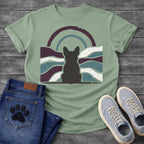 French Bulldog t-shirt with Frenchie silhouette seen from behind centered in a distressed wavy landscape of deep plum teal and cream, double concentric arch with arrow detail above, heavy vintage texture throughout, no text moody art graphic