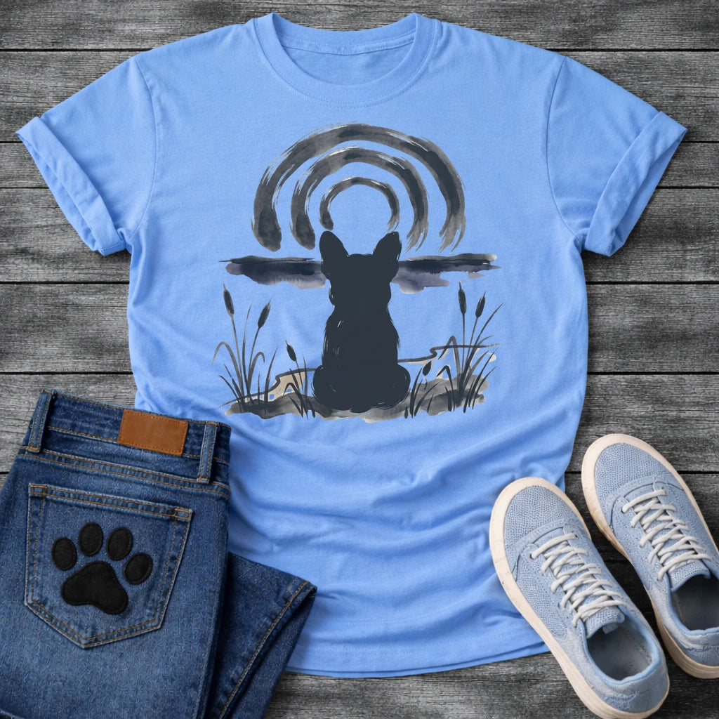 French Bulldog t-shirt with Frenchie silhouette seen from behind in ink wash style, sitting in brushstroke cattails and grass, dark watercolor horizon band, loose concentric ink arch above, single dark ink tone, no text sumi-e art graphic
