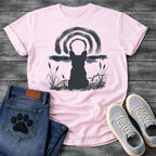 French Bulldog t-shirt with Frenchie silhouette seen from behind in ink wash style, sitting in brushstroke cattails and grass, dark watercolor horizon band, loose concentric ink arch above, single dark ink tone, no text sumi-e art graphic
