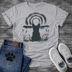 French Bulldog t-shirt with Frenchie silhouette seen from behind in ink wash style, sitting in brushstroke cattails and grass, dark watercolor horizon band, loose concentric ink arch above, single dark ink tone, no text sumi-e art graphic
