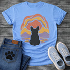 French Bulldog t-shirt with Frenchie silhouette seen from behind centered in a layered organic landscape of terracotta gold and soft purple flowing forms, color rippling in a water reflection below, no text warm painterly art graphic