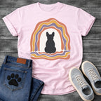 French Bulldog t-shirt with Frenchie silhouette seen from behind centered in a cream open space, surrounded by layered organic concentric arch in terracotta gold and soft purple, wavy lines trailing below, no text soft boho art graphic
