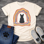 French Bulldog t-shirt with Frenchie silhouette seen from behind centered in a cream open space, surrounded by layered organic concentric arch in terracotta gold and soft purple, wavy lines trailing below, no text soft boho art graphic
