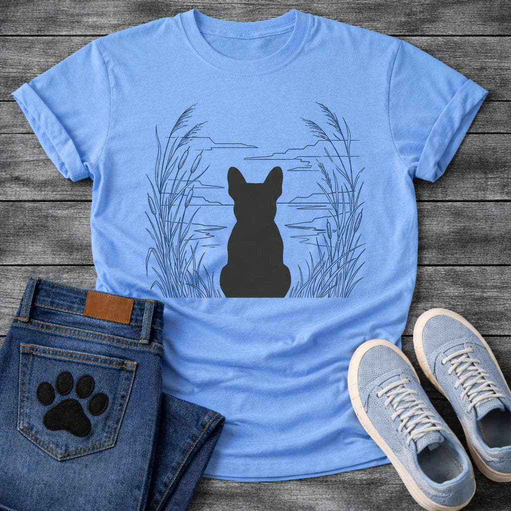 French Bulldog t-shirt with Frenchie silhouette seen from behind centered in a wide open navy line art botanical scene, tall reeds and cattails sweeping in from both sides, rippling water and distant mountain horizon ahead, no text refined nature illustration