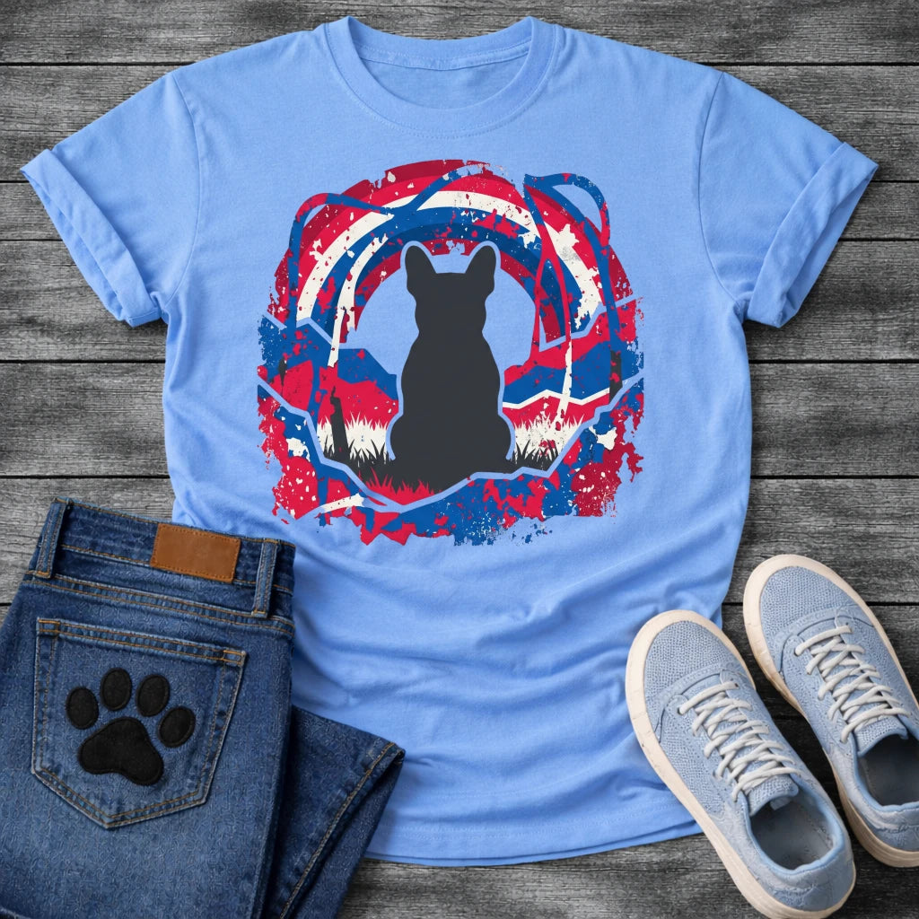 French Bulldog t-shirt with Frenchie silhouette seen from behind sitting in grass, centered in a bold distressed red white and blue swirling circular composition with heavy paint splatter throughout, no text patriotic art graphic