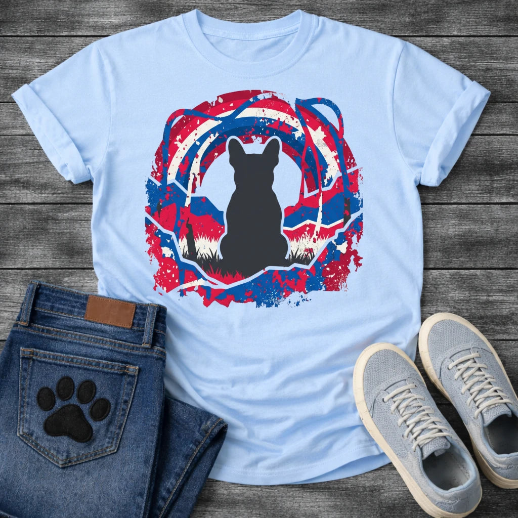 French Bulldog t-shirt with Frenchie silhouette seen from behind sitting in grass, centered in a bold distressed red white and blue swirling circular composition with heavy paint splatter throughout, no text patriotic art graphic