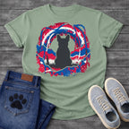 French Bulldog t-shirt with Frenchie silhouette seen from behind sitting in grass, centered in a bold distressed red white and blue swirling circular composition with heavy paint splatter throughout, no text patriotic art graphic