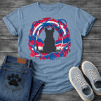 French Bulldog t-shirt with Frenchie silhouette seen from behind sitting in grass, centered in a bold distressed red white and blue swirling circular composition with heavy paint splatter throughout, no text patriotic art graphic