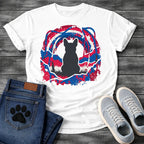French Bulldog t-shirt with Frenchie silhouette seen from behind sitting in grass, centered in a bold distressed red white and blue swirling circular composition with heavy paint splatter throughout, no text patriotic art graphic