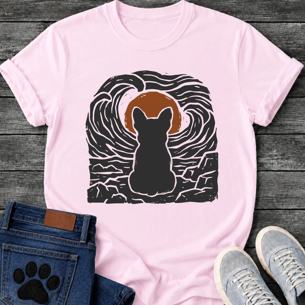 French Bulldog t-shirt with Frenchie silhouette seen from behind sitting on cracked rock, bold swirling woodcut style sky in black and cream surrounding a terracotta moon, heavy linocut print texture throughout, no text dramatic art graphic
