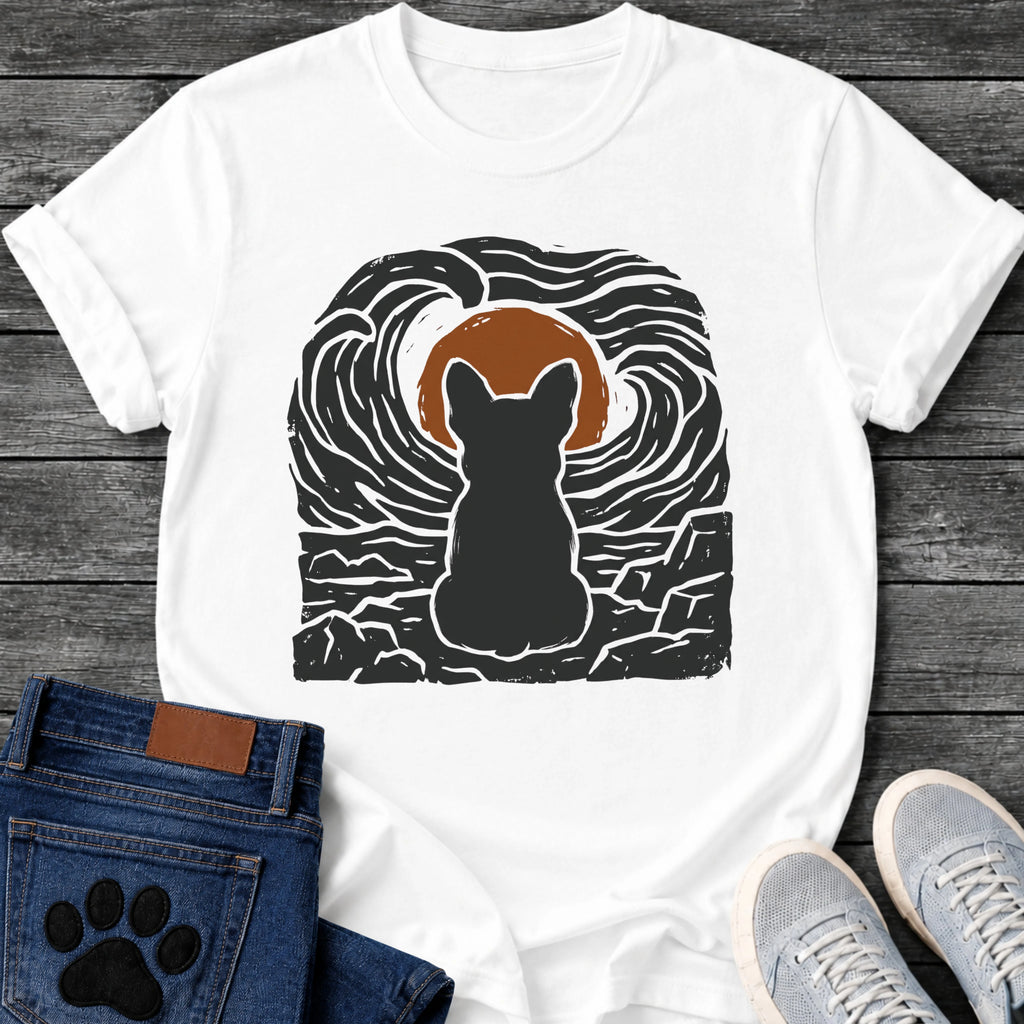 French Bulldog t-shirt with Frenchie silhouette seen from behind sitting on cracked rock, bold swirling woodcut style sky in black and cream surrounding a terracotta moon, heavy linocut print texture throughout, no text dramatic art graphic
